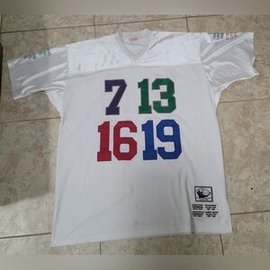 Mitchell & Ness Quarterbacks of the Century football jersey.